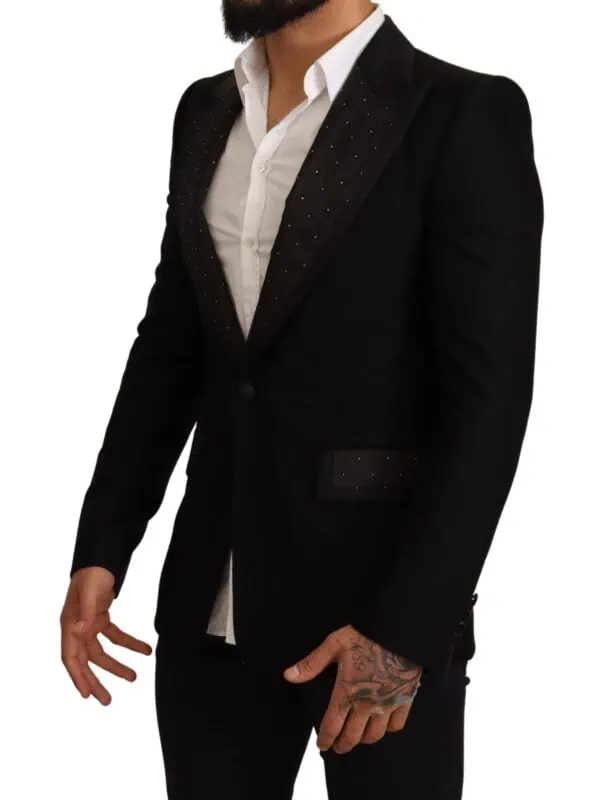 Black tailored blazer with subtle rhinestone embellishments, perfect for formal occasions or stylish events.