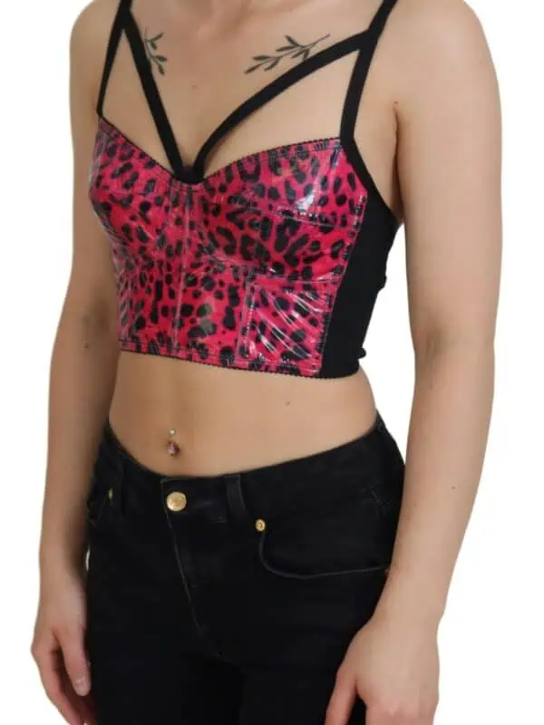 Leopard print and black crop top with strappy details, perfect for stylish casual wear.