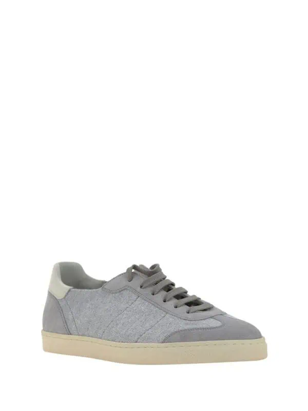 Comfortable grey canvas casual sneaker with beige sole and lace-up closure, perfect for everyday wear and stylish casual outfits.