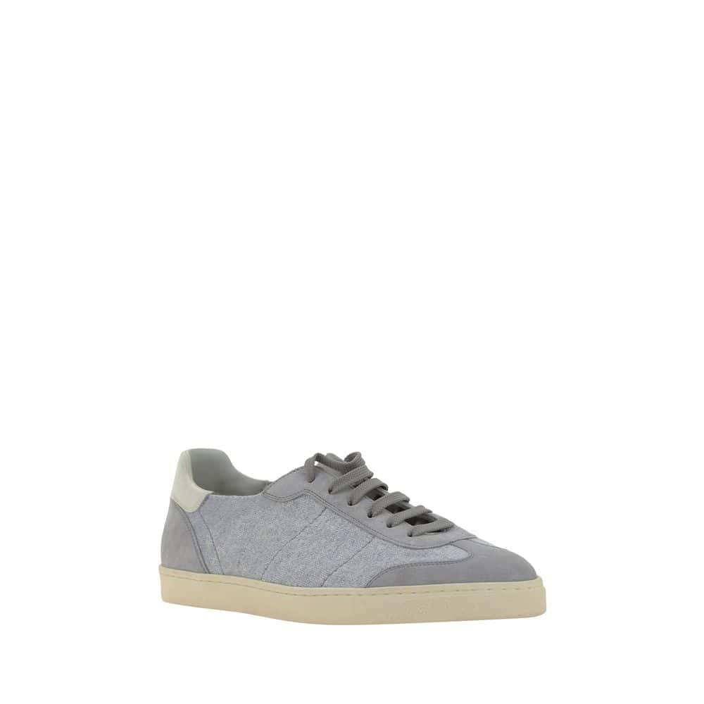 Comfortable grey canvas casual sneaker with beige sole and lace-up closure, perfect for everyday wear and stylish casual outfits.