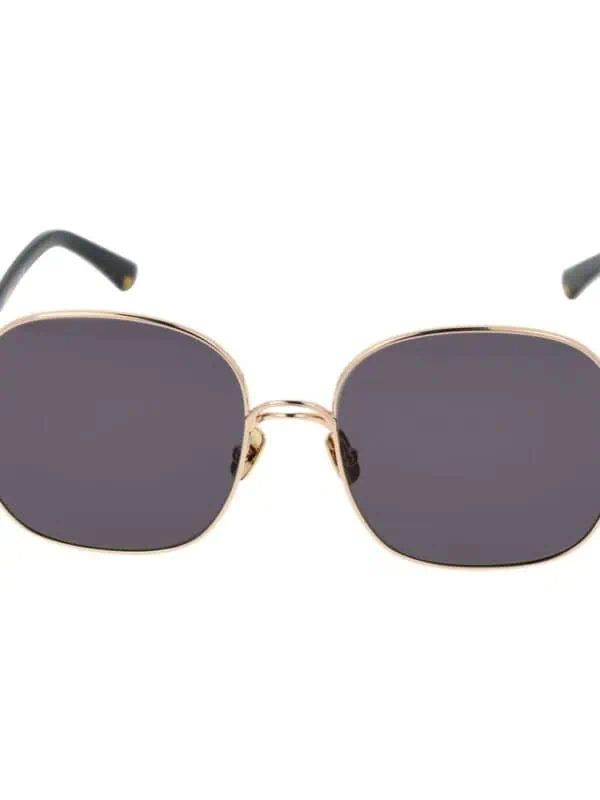 Vintage square sunglasses with gold metal frame and dark tinted lenses, stylish and UV-protective for a chic summer look.