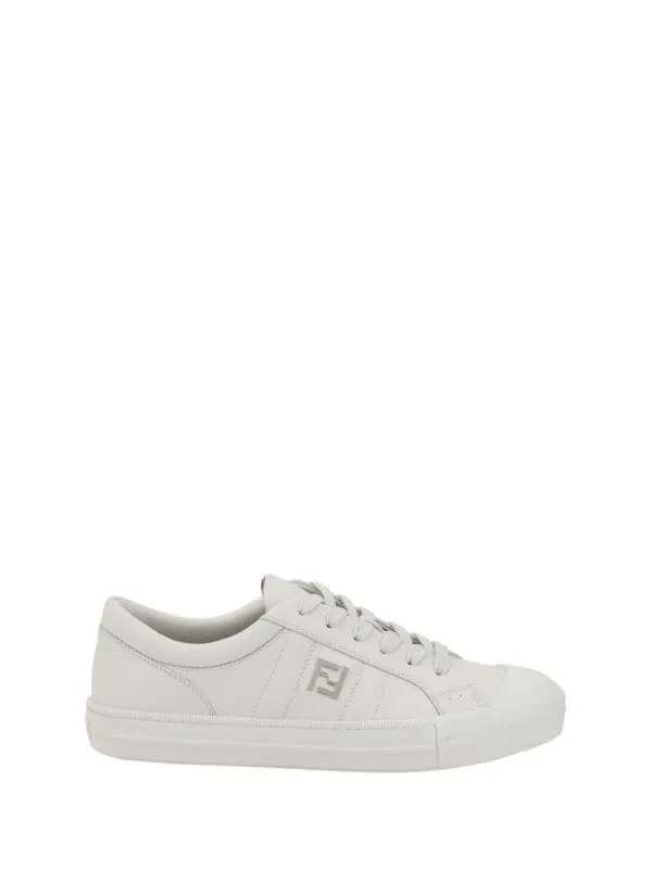 White luxury sneakers with minimalist design and subtle logo detail for stylish everyday wear, available at Lux Brands.