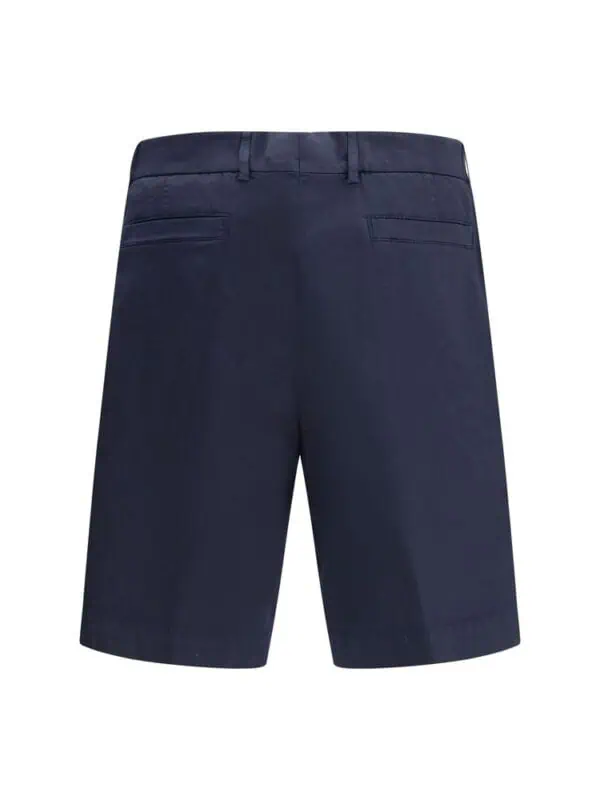 Stylish navy blue men's dress shorts with tailored fit, belt loops, and back welt pockets, perfect for upscale casual or office wear.
