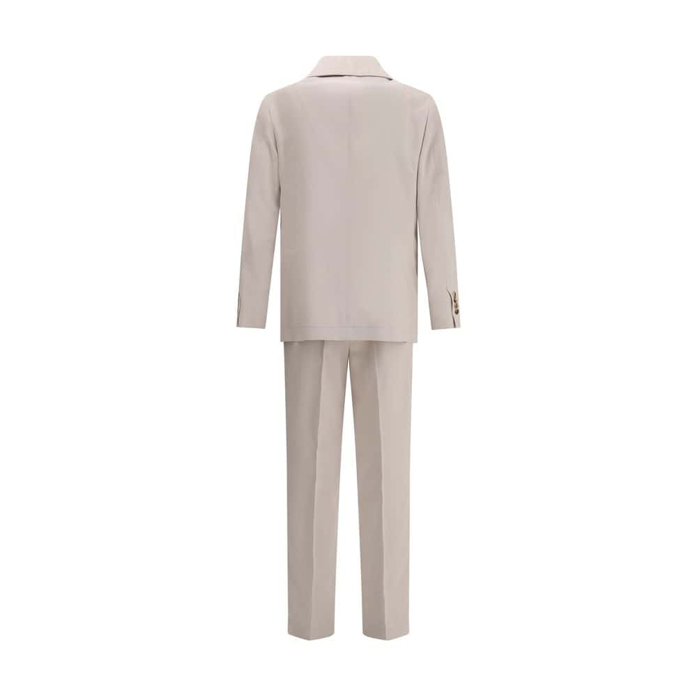 Slim fit beige suit with tailored blazer and matching trousers, perfect for formal or business occasions. Crafted from high-quality fabric for a stylish and sophisticated look.