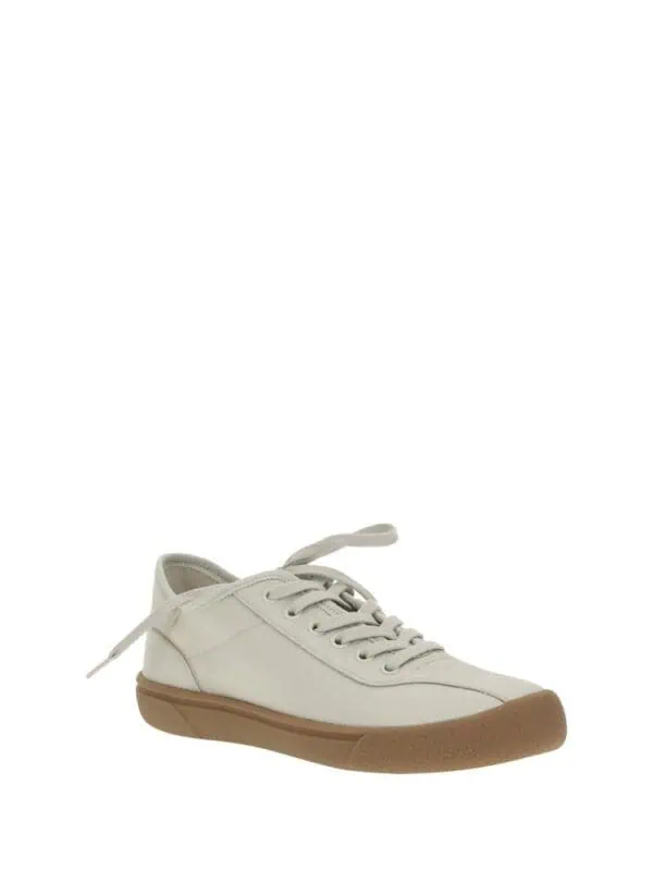 White casual sneakers with beige rubber sole, lightweight and stylish footwear for everyday wear. Perfect for a relaxed, comfortable look.