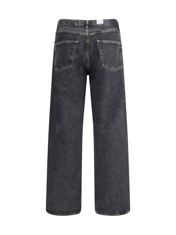 Denim wide-leg jeans in dark wash with classic five-pocket styling and high-waisted fit. Perfect for casual and streetwear fashion looks.