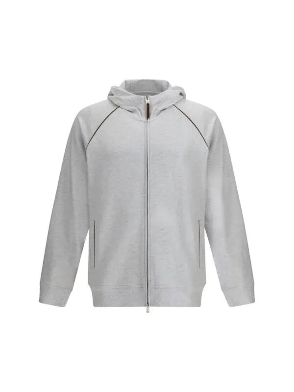 Soft grey zip-up hoodie with a comfortable fit and stylish piping details, perfect for casual wear. Luxurious, high-quality fabric offers warmth and style for men and women.
