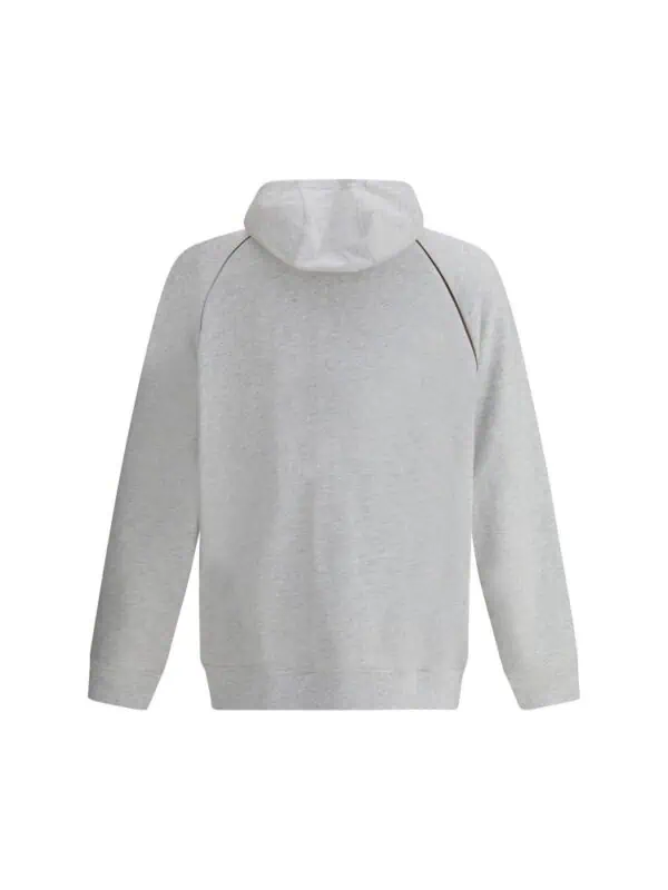 Comfy light grey hoodie with modern design, casual streetwear style, and contrast piping, perfect for everyday wear and layering in cool weather.