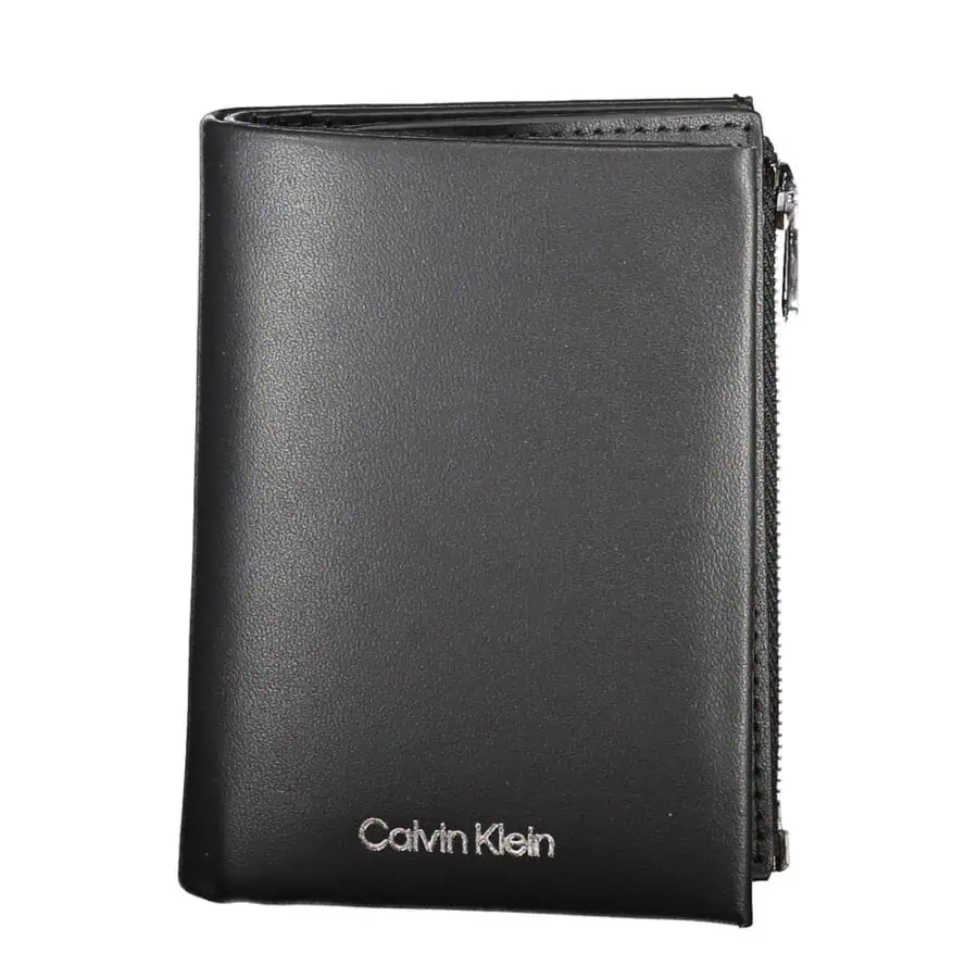 Black Calvin Klein leather zip-around wallet with silver branding and card slots.