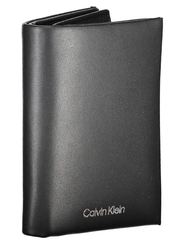Black Calvin Klein men's bi-fold wallet made of genuine leather with silver logo embossing, slim design, and multiple card slots for everyday use.