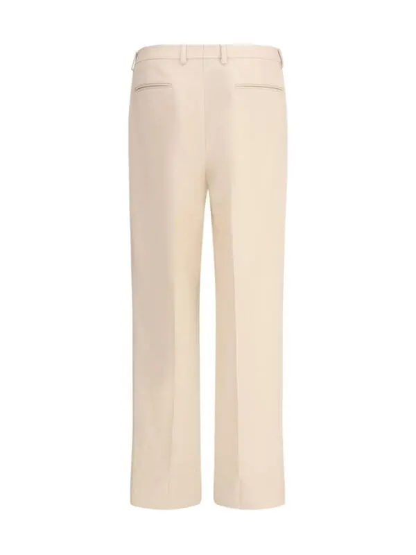 Cream tailored dress pants with front pleats and back welt pockets, perfect for business or formal occasions. Made from high-quality, comfortable fabric for all-day wear.