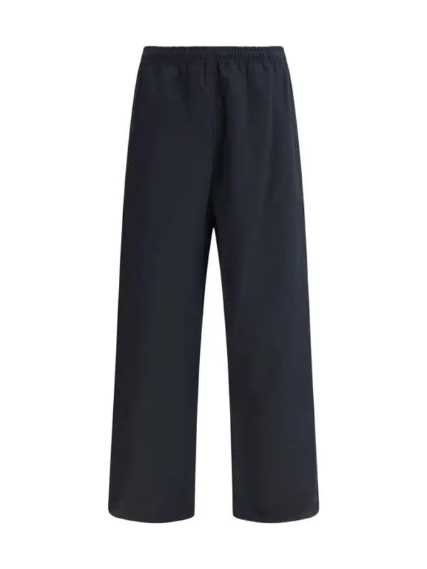 Black men's wide-leg casual pants with an elastic waistband, perfect for comfortable everyday wear or relaxed occasions. Made from high-quality fabric for durability and style.