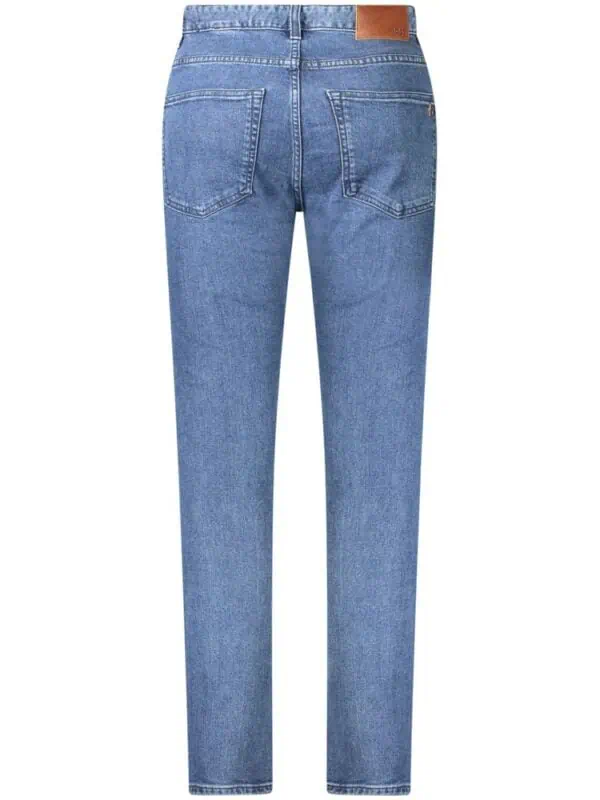 Relaxed fit blue denim jeans with a classic 5-pocket design and leather patch detail at the waistband, perfect for casual and stylish everyday wear.