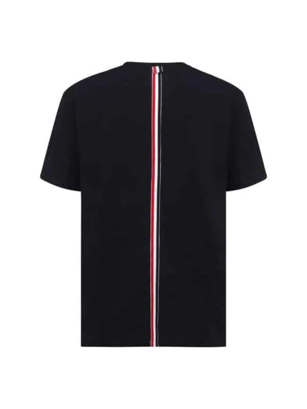 Black designer T-shirt with vertical red, white, and blue stripe detail from Lux Brands.
