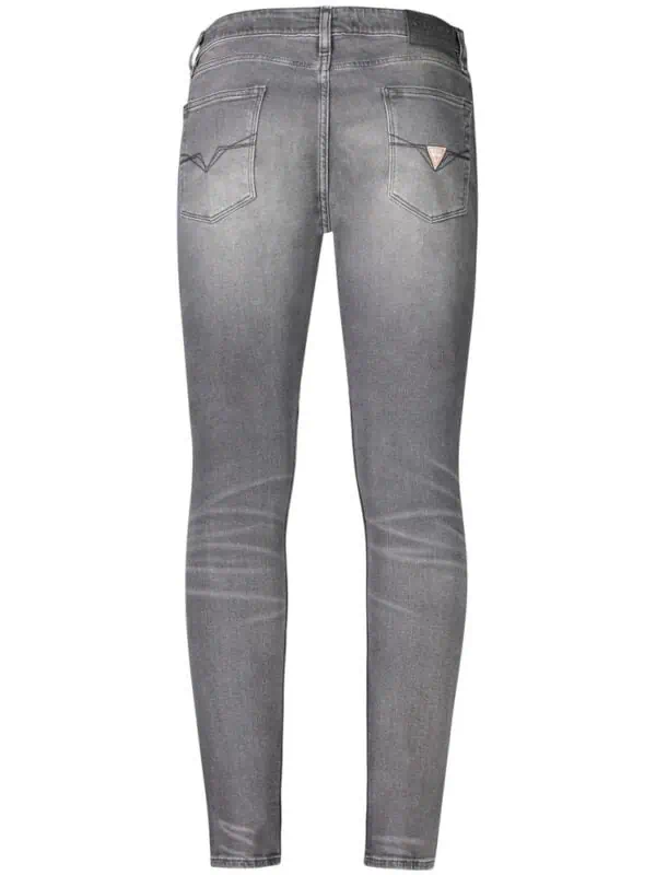 Designer gray skinny jeans with distressed details and brand logo on back pocket, perfect for casual streetwear.