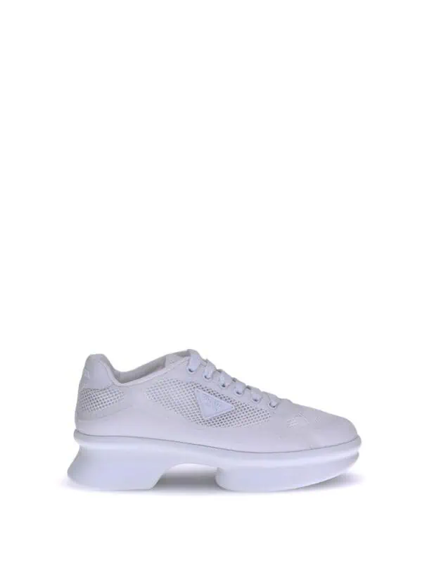 White chunky sneaker with breathable mesh design and thick platform sole for a bold, modern look. Perfect for stylish casual wear and street fashion.