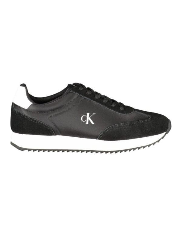 Black and white Calvin Klein sneakers with sleek design and comfortable fit for stylish casual wear. Perfect for everyday fashion and sporty look.