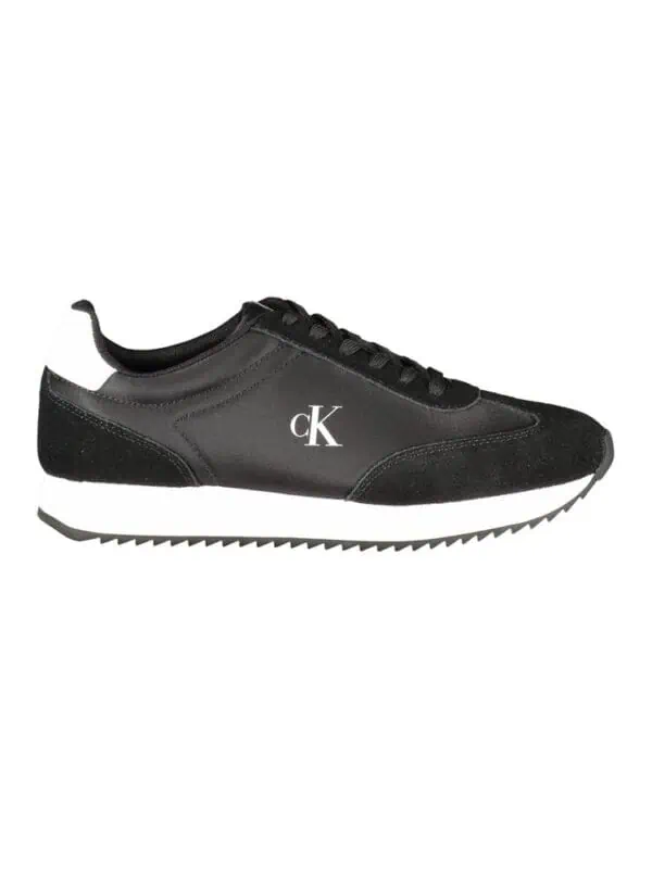 Black and white Calvin Klein sneakers with sleek design and comfortable fit for stylish casual wear. Perfect for everyday fashion and sporty look.