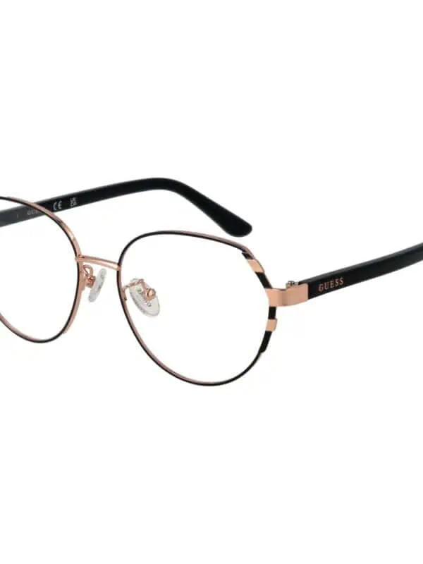 Elegant Guess women's eyeglasses with round frames, rose gold accents, and black temple arms for a stylish, sophisticated look. Perfect accessories for fashion-forward women.