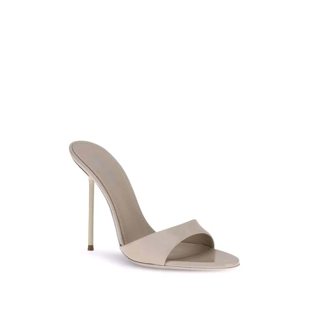 Elegant beige high-heeled sandal with open toe and slender stiletto, perfect for stylish occasions.