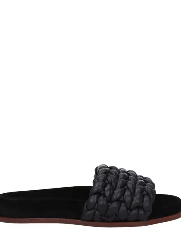 Lux black slide sandal with braided strap, made of soft materials for casual and stylish comfort. Perfect for summer outings and relaxed wear.