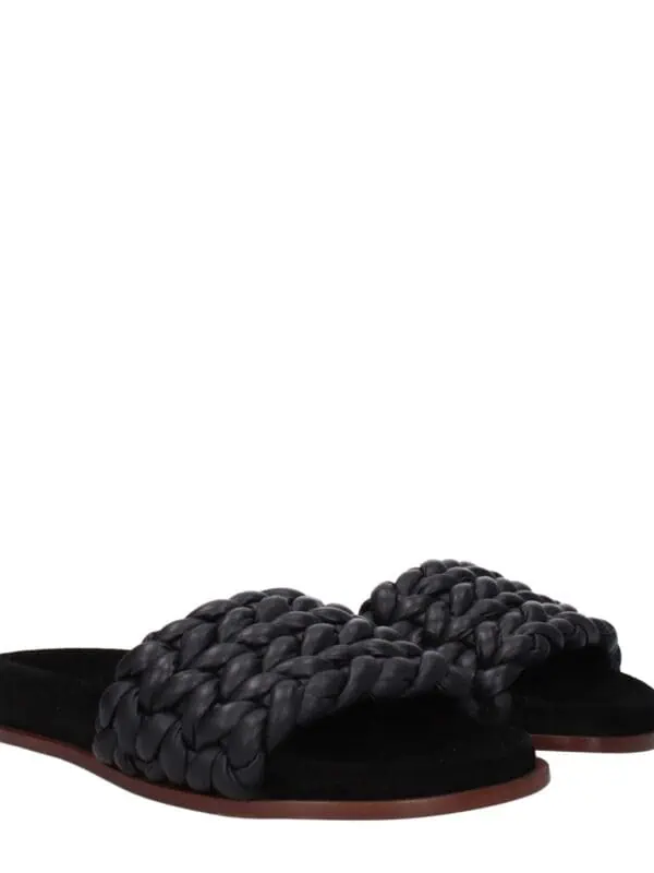 Black braided slip-on sandals with cushioned footbed and flat sole, perfect for casual summer wear.