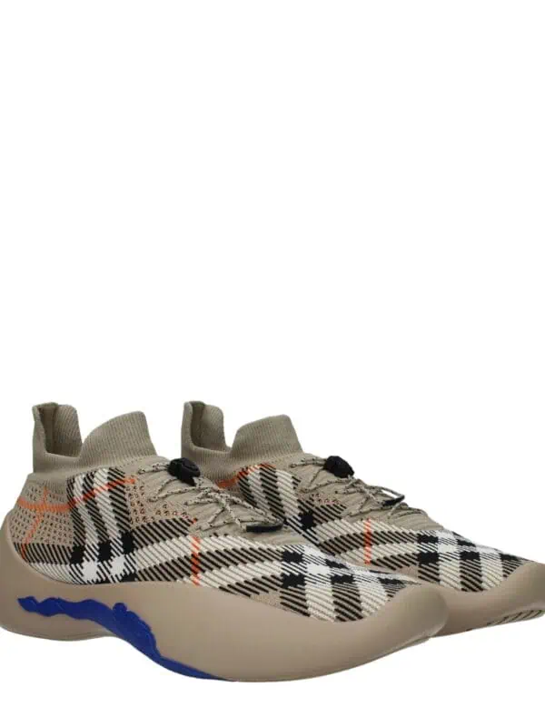 Comfortable plaid sneakers with sock-like ankle design and cushioned soles, combining style and performance for casual or athletic wear.