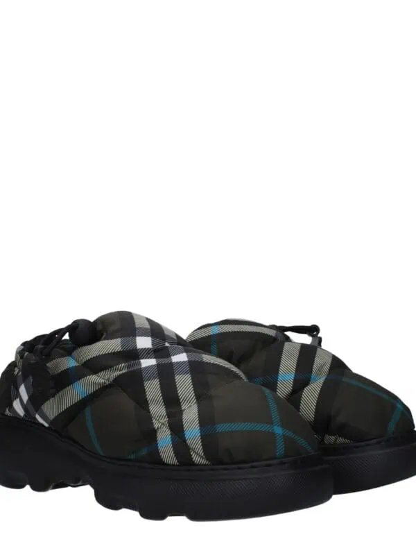 1. Classic black, beige, white, and blue plaid patterned slip-on sneakers with cushioned soles and elastic laces for comfortable casual wear.