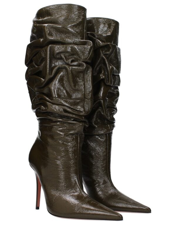 Luxurious brown ruched leather thigh-high boots with pointed toes and stiletto heels, perfect for high fashion and trendy urban wear.