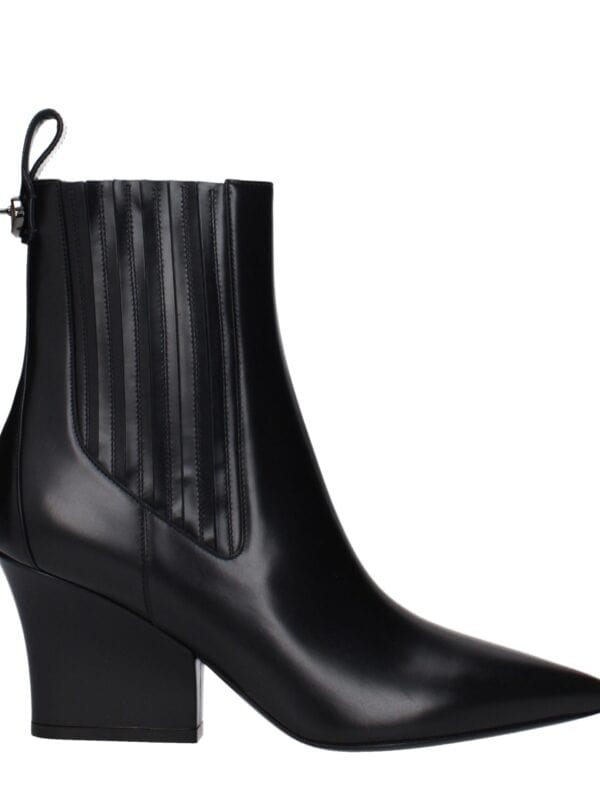 Black leather pointed-toe ankle boot with side elastic panels and a chunky block heel, perfect for stylish fall and winter outfits.
