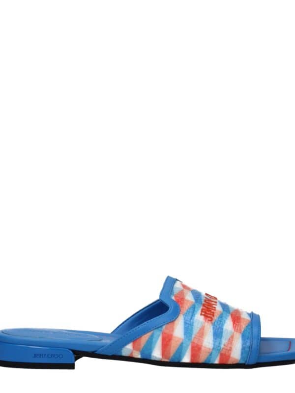 Bright blue slide sandals with colorful geometric pattern and embroidered logo, stylish and comfortable footwear by Jimmy Choo for luxurious casual wear.