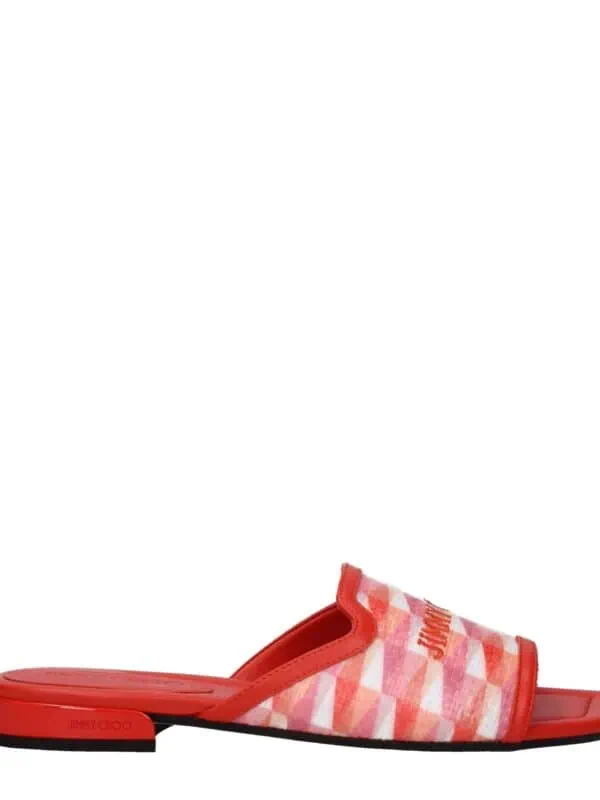 Bright pink, red, and white geometric patterned Jimmy Choo slide sandal with open toe, wide strap, and cushioned footbed for stylish comfort.