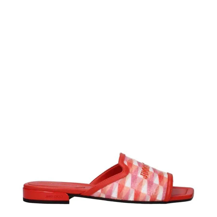 Bright pink, red, and white geometric patterned Jimmy Choo slide sandal with open toe, wide strap, and cushioned footbed for stylish comfort.