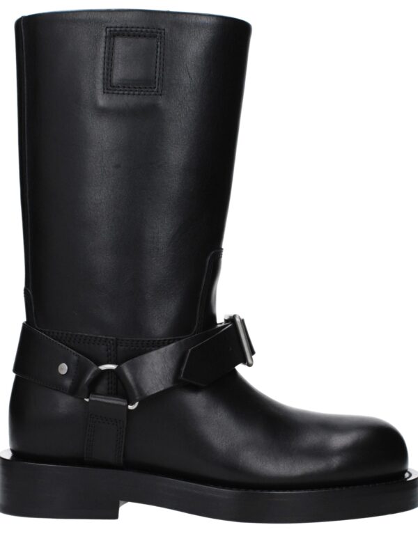 1. Black leather knee-high fashion boot with adjustable strap and buckle detail, perfect for luxury and stylish winter wear.