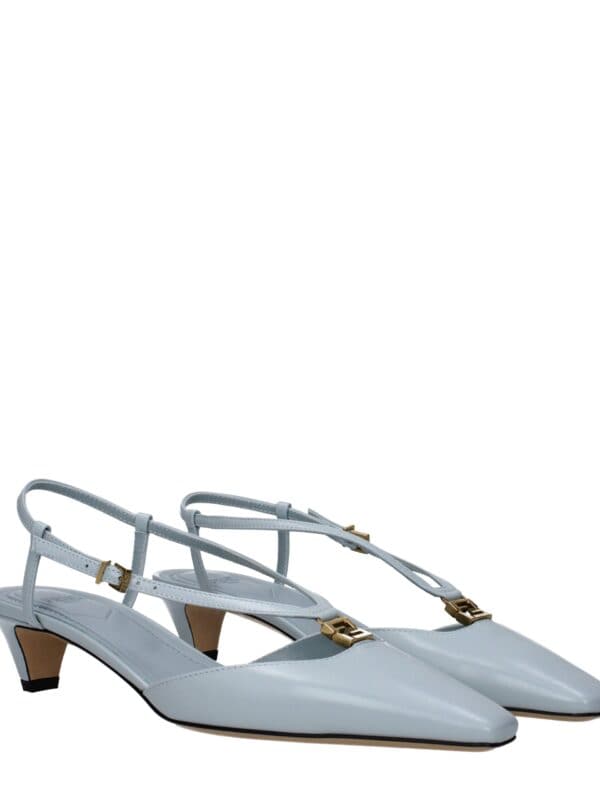 Elegant white pointed-toe slingback heels with gold hardware accents for a chic and sophisticated look, perfect for formal occasions and stylish outfits.