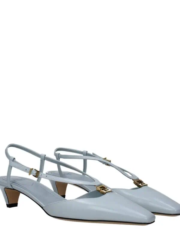 Elegant white pointed-toe slingback heels with gold hardware accents for a chic and sophisticated look, perfect for formal occasions and stylish outfits.