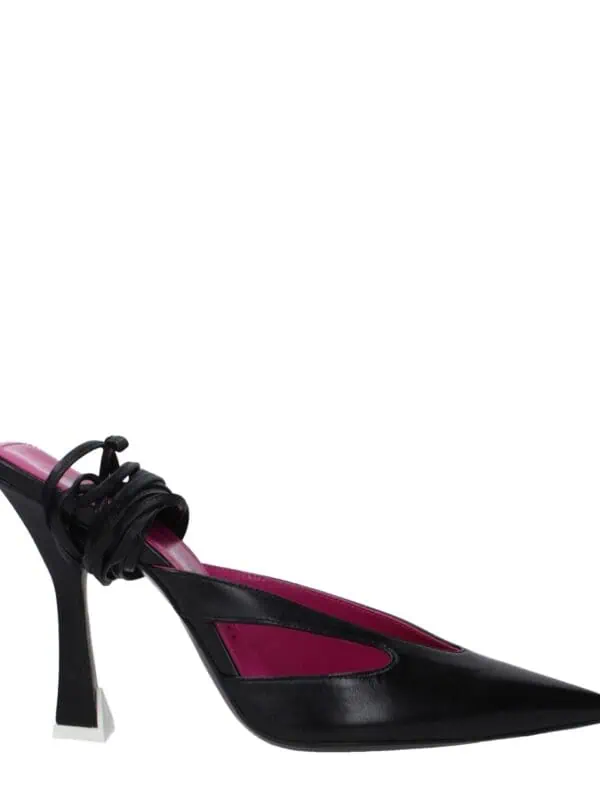 Elegant black leather pointed-toe high heel with stylish ankle tie detail and a unique sculpted white accent heel, perfect for chic and luxurious wardrobe upgrades.