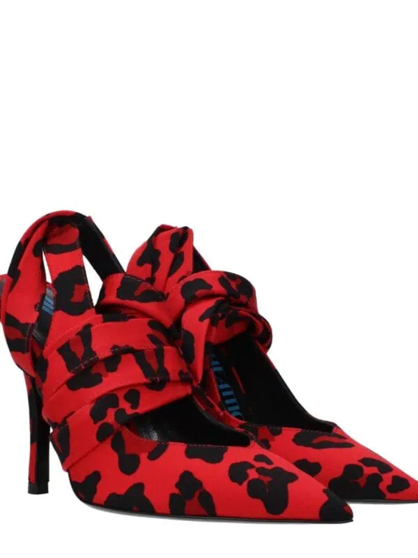 Red leopard print high-heeled shoes with pointed toes and stylish bow details. Perfect for making a bold fashion statement and elevating your look for special occasions or parties.