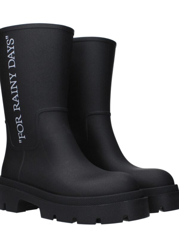 Black waterproof rain boots with bold white text "FOR RAINY DAYS" on the side, featuring chunky soles and a sleek matte finish, perfect for stylish rainy weather wear.