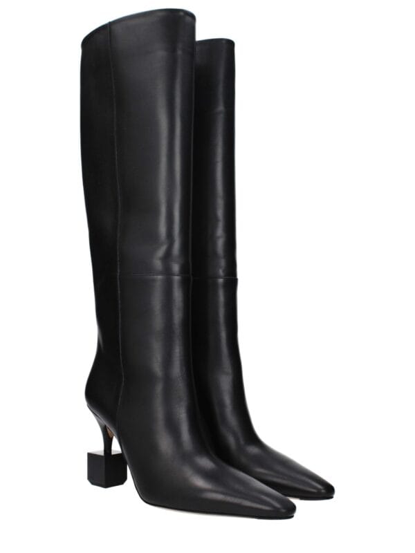 Elegant black leather knee-high boots with pointed toes and unique block heels, perfect for luxury fashion statements and stylish occasions.
