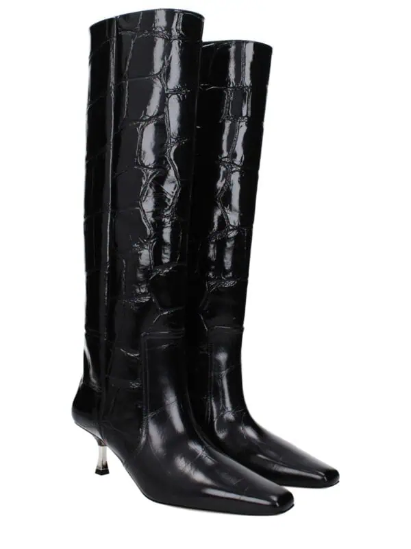 Bold black crocodile-embossed leather knee-high boots featuring pointed toes and sleek stiletto heels for a luxurious, high-fashion look. Perfect for making a statement in any sophisticated wardrobe.