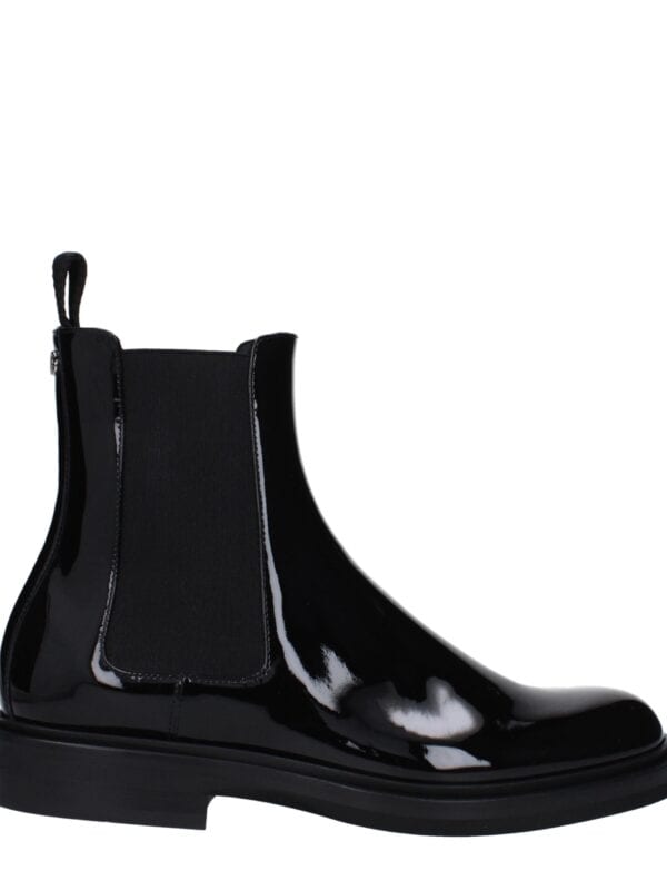 Glossy black patent leather ankle boot with elastic side panels and pull tab, stylish and modern footwear for versatile casual or dressy occasions.