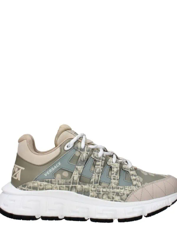 Luxurious beige and gray Versace sneakers featuring crocodile print details, sturdy sole, and designer branding, perfect for stylish casual wear.
