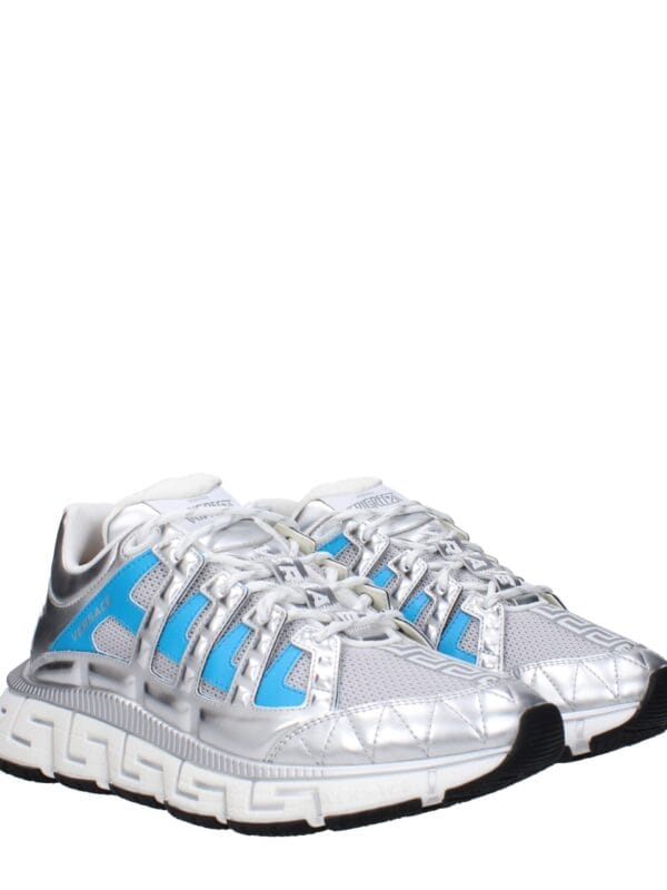 1. Luxe Versace Chain Reaction sneakers with silver, blue accents, and intricate design, perfect for luxury footwear enthusiasts.