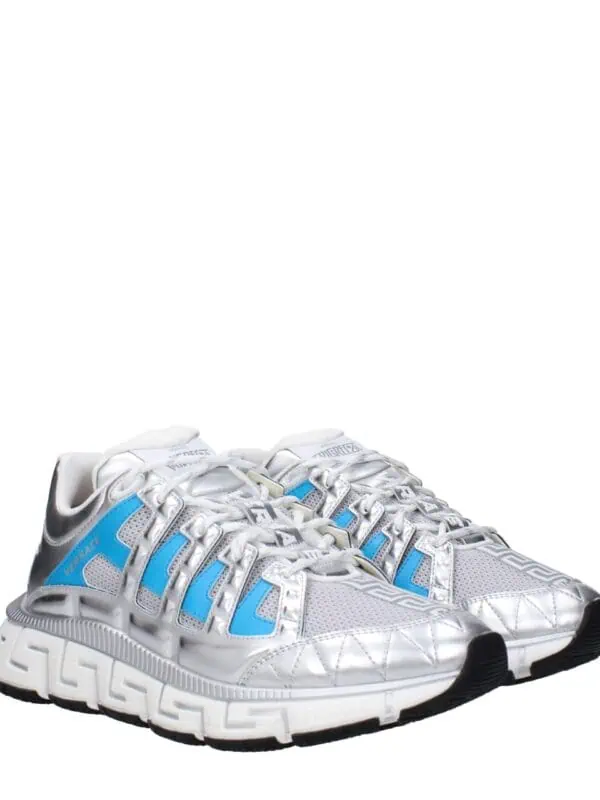 1. Luxe Versace Chain Reaction sneakers with silver, blue accents, and intricate design, perfect for luxury footwear enthusiasts.
