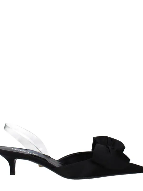 1. Elegant black Versace pointed toe mule with bow detail, low heel, and transparent strap for a luxurious, stylish look.