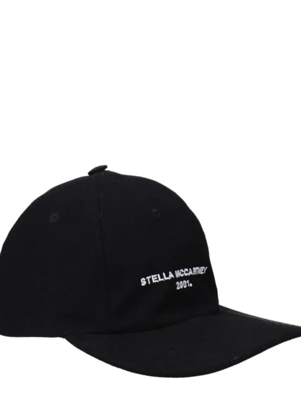 Premium black Stella McCartney baseball cap with white embroidered logo and adjustable strap, perfect for stylish casual wear.