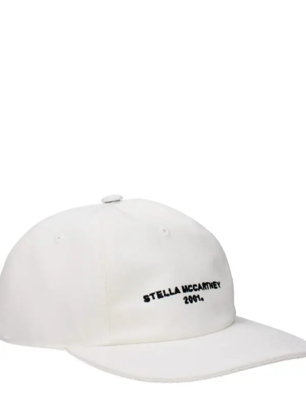 White Stella McCartney baseball cap with black embroidered logo, adjustable strap, and curved brim, perfect for casual and sporty everyday wear.