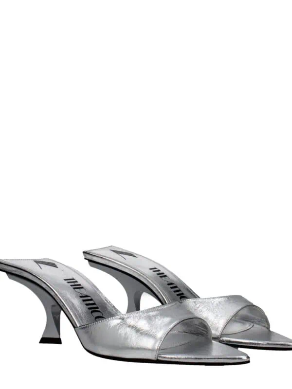Silver metallic high-heel mules with open toes, chic design, and branded insoles, perfect for fashionable and elegant outings.
