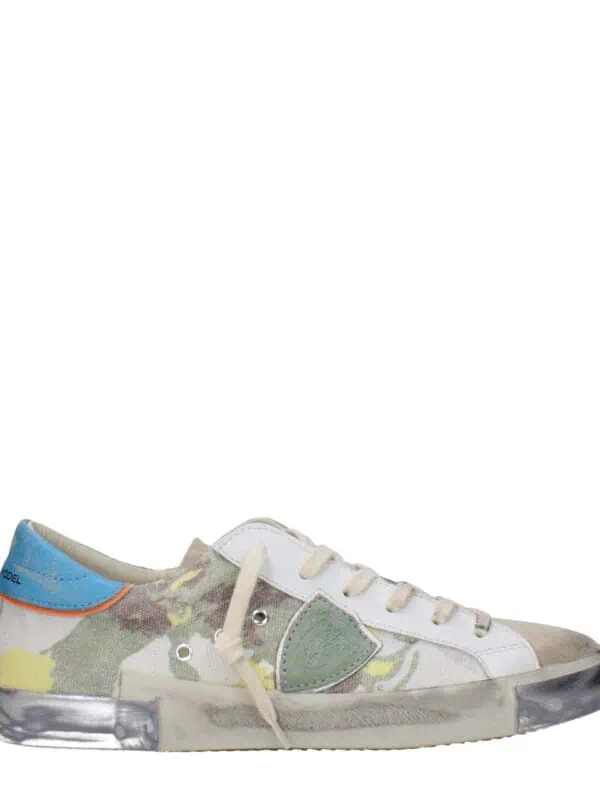 1. Colorful designer sneaker with mixed materials, camouflage print, and vibrant accents, perfect for a trendy and casual look.